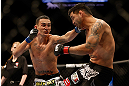 LAS VEGAS, NV - DECEMBER 29:  Max Holloway punches Leonard Garcia during their featherweight fight at UFC 155 on December 29, 2012 at MGM Grand Garden Arena in Las Vegas, Nevada. (Photo by Josh Hedges/Zuffa LLC/Zuffa LLC via Getty Images) *** Local Caption *** Leonard Garcia; Max Holloway
