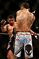LAS VEGAS, NV - DECEMBER 29:  (L-R) Leonard Garcia kicks Max Holloway during their featherweight fight at UFC 155 on December 29, 2012 at MGM Grand Garden Arena in Las Vegas, Nevada. (Photo by Josh Hedges/Zuffa LLC/Zuffa LLC via Getty Images) *** Local Caption *** Leonard Garcia; Max Holloway