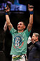 LAS VEGAS, NV - DECEMBER 29:  Max Holloway is declared the winner over Leonard Garcia after their featherweight fight at UFC 155 on December 29, 2012 at MGM Grand Garden Arena in Las Vegas, Nevada. (Photo by Josh Hedges/Zuffa LLC/Zuffa LLC via Getty Images) *** Local Caption *** Leonard Garcia; Max Holloway