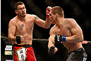 LAS VEGAS, NV - DECEMBER 29:  Todd Duffee (right) punches Phil De Fries during their heavyweight fight at UFC 155 on December 29, 2012 at MGM Grand Garden Arena in Las Vegas, Nevada. (Photo by Josh Hedges/Zuffa LLC/Zuffa LLC via Getty Images) *** Local Caption *** Phil De Fries; Todd Duffee