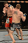 LAS VEGAS, NV - DECEMBER 29:  (R-L) Todd Duffee punches Phil De Fries during their heavyweight fight at UFC 155 on December 29, 2012 at MGM Grand Garden Arena in Las Vegas, Nevada. (Photo by Donald Miralle/Zuffa LLC/Zuffa LLC via Getty Images) *** Local Caption *** Phil De Fries; Todd Duffee
