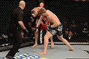 LAS VEGAS, NV - DECEMBER 29:  (R-L) Todd Duffee punches Phil De Fries during their heavyweight fight at UFC 155 on December 29, 2012 at MGM Grand Garden Arena in Las Vegas, Nevada. (Photo by Donald Miralle/Zuffa LLC/Zuffa LLC via Getty Images) *** Local Caption *** Phil De Fries; Todd Duffee