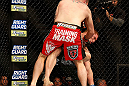 LAS VEGAS, NV - DECEMBER 29:  Phil De Fries (red shorts) punches Todd Duffee during their heavyweight fight at UFC 155 on December 29, 2012 at MGM Grand Garden Arena in Las Vegas, Nevada. (Photo by Josh Hedges/Zuffa LLC/Zuffa LLC via Getty Images) *** Local Caption *** Phil De Fries; Todd Duffee