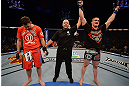 LAS VEGAS, NV - DECEMBER 29:  Todd Duffee (right) is declared the winner over Phil De Fries (left) after their heavyweight fight at UFC 155 on December 29, 2012 at MGM Grand Garden Arena in Las Vegas, Nevada. (Photo by Donald Miralle/Zuffa LLC/Zuffa LLC via Getty Images) *** Local Caption *** Phil De Fries; Todd Duffee