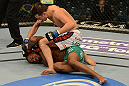 LAS VEGAS, NV - DECEMBER 29:  Myles Jury (top) punches Michael Johnson during their lightweight fight at UFC 155 on December 29, 2012 at MGM Grand Garden Arena in Las Vegas, Nevada. (Photo by Donald Miralle/Zuffa LLC/Zuffa LLC via Getty Images) *** Local Caption *** Michael Johnson; Myles Jury