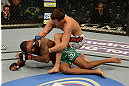 LAS VEGAS, NV - DECEMBER 29:  Myles Jury (top) punches Michael Johnson during their lightweight fight at UFC 155 on December 29, 2012 at MGM Grand Garden Arena in Las Vegas, Nevada. (Photo by Donald Miralle/Zuffa LLC/Zuffa LLC via Getty Images) *** Local Caption *** Michael Johnson; Myles Jury
