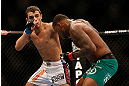 LAS VEGAS, NV - DECEMBER 29:  (L-R) Myles Jury punches Michael Johnson during their lightweight fight at UFC 155 on December 29, 2012 at MGM Grand Garden Arena in Las Vegas, Nevada. (Photo by Josh Hedges/Zuffa LLC/Zuffa LLC via Getty Images) *** Local Caption *** Michael Johnson; Myles Jury