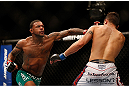 LAS VEGAS, NV - DECEMBER 29:  (L-R) Michael Johnson punches Myles Jury during their lightweight fight at UFC 155 on December 29, 2012 at MGM Grand Garden Arena in Las Vegas, Nevada. (Photo by Josh Hedges/Zuffa LLC/Zuffa LLC via Getty Images) *** Local Caption *** Michael Johnson; Myles Jury
