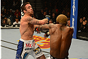 LAS VEGAS, NV - DECEMBER 29:  (L-R) Jamie Varner punches Melvin Guillard during their lightweight fight at UFC 155 on December 29, 2012 at MGM Grand Garden Arena in Las Vegas, Nevada. (Photo by Donald Miralle/Zuffa LLC/Zuffa LLC via Getty Images) *** Local Caption *** Melvin Guillard; Jamie Varner