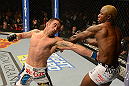 LAS VEGAS, NV - DECEMBER 29:  (L-R) Jamie Varner punches Melvin Guillard during their lightweight fight at UFC 155 on December 29, 2012 at MGM Grand Garden Arena in Las Vegas, Nevada. (Photo by Donald Miralle/Zuffa LLC/Zuffa LLC via Getty Images) *** Local Caption *** Melvin Guillard; Jamie Varner