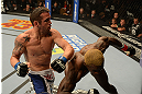 LAS VEGAS, NV - DECEMBER 29:  (L-R) Jamie Varner punches Melvin Guillard during their lightweight fight at UFC 155 on December 29, 2012 at MGM Grand Garden Arena in Las Vegas, Nevada. (Photo by Donald Miralle/Zuffa LLC/Zuffa LLC via Getty Images) *** Local Caption *** Melvin Guillard; Jamie Varner