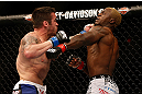 LAS VEGAS, NV - DECEMBER 29:  (L-R) Jamie Varner punches Melvin Guillard during their lightweight fight at UFC 155 on December 29, 2012 at MGM Grand Garden Arena in Las Vegas, Nevada. (Photo by Josh Hedges/Zuffa LLC/Zuffa LLC via Getty Images) *** Local Caption *** Melvin Guillard; Jamie Varner
