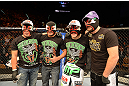 LAS VEGAS, NV - DECEMBER 29:  Erik Perez (second from right) and teammates wearing lucha libre masks at UFC 155 on December 29, 2012 at MGM Grand Garden Arena in Las Vegas, Nevada. (Photo by Donald Miralle/Zuffa LLC/Zuffa LLC via Getty Images) *** Local Caption *** Erik Perez; Byron Bloodworth
