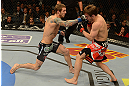 LAS VEGAS, NV - DECEMBER 29:  (L-R) Eddie Wineland punches Brad Pickett during their bantamweight fight at UFC 155 on December 29, 2012 at MGM Grand Garden Arena in Las Vegas, Nevada. (Photo by Donald Miralle/Zuffa LLC/Zuffa LLC via Getty Images) *** Local Caption *** Brad Pickett; Eddie Wineland