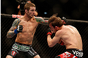 LAS VEGAS, NV - DECEMBER 29:  (L-R) Eddie Wineland punches Brad Pickett during their bantamweight fight at UFC 155 on December 29, 2012 at MGM Grand Garden Arena in Las Vegas, Nevada. (Photo by Josh Hedges/Zuffa LLC/Zuffa LLC via Getty Images) *** Local Caption *** Brad Pickett; Eddie Wineland