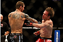 LAS VEGAS, NV - DECEMBER 29:  (L-R) Eddie Wineland punches Brad Pickett during their bantamweight fight at UFC 155 on December 29, 2012 at MGM Grand Garden Arena in Las Vegas, Nevada. (Photo by Josh Hedges/Zuffa LLC/Zuffa LLC via Getty Images) *** Local Caption *** Brad Pickett; Eddie Wineland