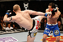 LAS VEGAS, NV - DECEMBER 29:  (L-R) Alan Belcher kicks Yushin Okami during their middleweight fight at UFC 155 on December 29, 2012 at MGM Grand Garden Arena in Las Vegas, Nevada. (Photo by Josh Hedges/Zuffa LLC/Zuffa LLC via Getty Images) *** Local Caption *** Yushin Okami; Alan Belcher
