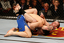 LAS VEGAS, NV - DECEMBER 29:  Alan Belcher (right) attempts to submit Yushin Okami during their middleweight fight at UFC 155 on December 29, 2012 at MGM Grand Garden Arena in Las Vegas, Nevada. (Photo by Josh Hedges/Zuffa LLC/Zuffa LLC via Getty Images) *** Local Caption *** Yushin Okami; Alan Belcher