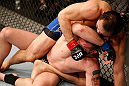 LAS VEGAS, NV - DECEMBER 29:  Yushin Okami (top) punches Alan Belcher during their middleweight fight at UFC 155 on December 29, 2012 at MGM Grand Garden Arena in Las Vegas, Nevada. (Photo by Josh Hedges/Zuffa LLC/Zuffa LLC via Getty Images) *** Local Caption *** Yushin Okami; Alan Belcher