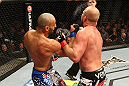 LAS VEGAS, NV - DECEMBER 29:  (R-L) Constantinos Philippou punches Tim Boetsch during their middleweight fight at UFC 155 on December 29, 2012 at MGM Grand Garden Arena in Las Vegas, Nevada. (Photo by Josh Hedges/Zuffa LLC/Zuffa LLC via Getty Images) *** Local Caption *** Tim Boetsch; Constantinos Philippou