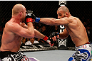 LAS VEGAS, NV - DECEMBER 29:  (R-L) Constantinos Philippou punches Tim Boetsch during their middleweight fight at UFC 155 on December 29, 2012 at MGM Grand Garden Arena in Las Vegas, Nevada. (Photo by Josh Hedges/Zuffa LLC/Zuffa LLC via Getty Images) *** Local Caption *** Tim Boetsch; Constantinos Philippou