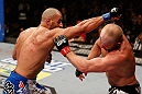 LAS VEGAS, NV - DECEMBER 29:  (L-R) Constantinos Philippou punches Tim Boetsch during their middleweight fight at UFC 155 on December 29, 2012 at MGM Grand Garden Arena in Las Vegas, Nevada. (Photo by Josh Hedges/Zuffa LLC/Zuffa LLC via Getty Images) *** Local Caption *** Tim Boetsch; Constantinos Philippou