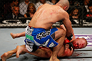 LAS VEGAS, NV - DECEMBER 29:  Constantinos Philippou (top) punches Tim Boetsch during their middleweight fight at UFC 155 on December 29, 2012 at MGM Grand Garden Arena in Las Vegas, Nevada. (Photo by Josh Hedges/Zuffa LLC/Zuffa LLC via Getty Images) *** Local Caption *** Tim Boetsch; Constantinos Philippou