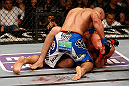 LAS VEGAS, NV - DECEMBER 29:  Constantinos Philippou (top) punches Tim Boetsch during their middleweight fight at UFC 155 on December 29, 2012 at MGM Grand Garden Arena in Las Vegas, Nevada. (Photo by Josh Hedges/Zuffa LLC/Zuffa LLC via Getty Images) *** Local Caption *** Tim Boetsch; Constantinos Philippou
