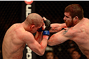LAS VEGAS, NV - DECEMBER 29:  (R-L) Jim Miller elbows Joe Lauzon during their lightweight fight at UFC 155 on December 29, 2012 at MGM Grand Garden Arena in Las Vegas, Nevada. (Photo by Donald Miralle/Zuffa LLC/Zuffa LLC via Getty Images) *** Local Caption *** Joe Lauzon; Jim Miller