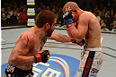 LAS VEGAS, NV - DECEMBER 29:  (L-R) Jim Miller punches Joe Lauzon during their lightweight fight at UFC 155 on December 29, 2012 at MGM Grand Garden Arena in Las Vegas, Nevada. (Photo by Donald Miralle/Zuffa LLC/Zuffa LLC via Getty Images) *** Local Caption *** Joe Lauzon; Jim Miller