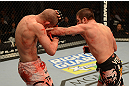 LAS VEGAS, NV - DECEMBER 29:  (R-L) Jim Miller punches Joe Lauzon during their lightweight fight at UFC 155 on December 29, 2012 at MGM Grand Garden Arena in Las Vegas, Nevada. (Photo by Donald Miralle/Zuffa LLC/Zuffa LLC via Getty Images) *** Local Caption *** Joe Lauzon; Jim Miller
