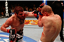 LAS VEGAS, NV - DECEMBER 29:  (L-R) Jim Miller punches Joe Lauzon during their lightweight fight at UFC 155 on December 29, 2012 at MGM Grand Garden Arena in Las Vegas, Nevada. (Photo by Donald Miralle/Zuffa LLC/Zuffa LLC via Getty Images) *** Local Caption *** Joe Lauzon; Jim Miller