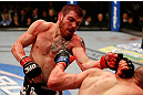 LAS VEGAS, NV - DECEMBER 29:  (L-R) Jim Miller punches Joe Lauzon during their lightweight fight at UFC 155 on December 29, 2012 at MGM Grand Garden Arena in Las Vegas, Nevada. (Photo by Donald Miralle/Zuffa LLC/Zuffa LLC via Getty Images) *** Local Caption *** Joe Lauzon; Jim Miller