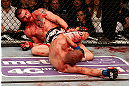 LAS VEGAS, NV - DECEMBER 29:  (R-L) Joe Lauzon attempts to submit Jim Miller during their lightweight fight at UFC 155 on December 29, 2012 at MGM Grand Garden Arena in Las Vegas, Nevada. (Photo by Josh Hedges/Zuffa LLC/Zuffa LLC via Getty Images) *** Local Caption *** Joe Lauzon; Jim Miller