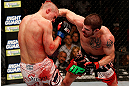 LAS VEGAS, NV - DECEMBER 29:  (R-L) Jim Miller punches Joe Lauzon during their lightweight fight at UFC 155 on December 29, 2012 at MGM Grand Garden Arena in Las Vegas, Nevada. (Photo by Josh Hedges/Zuffa LLC/Zuffa LLC via Getty Images) *** Local Caption *** Joe Lauzon; Jim Miller