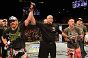 LAS VEGAS, NV - DECEMBER 29:  Jim Miller (left) reacts to being declared the winner over Joe Lauzon (right) after their lightweight fight at UFC 155 on December 29, 2012 at MGM Grand Garden Arena in Las Vegas, Nevada. (Photo by Donald Miralle/Zuffa LLC/Zuffa LLC via Getty Images) *** Local Caption *** Joe Lauzon; Jim Miller