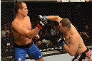 LAS VEGAS, NV - DECEMBER 29:  (R-L) Cain Velasquez punches Junior dos Santos during their heavyweight championship fight at UFC 155 on December 29, 2012 at MGM Grand Garden Arena in Las Vegas, Nevada. (Photo by Donald Miralle/Zuffa LLC/Zuffa LLC via Getty Images) *** Local Caption *** Junior dos Santos; Cain Velasquez