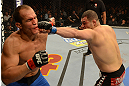 LAS VEGAS, NV - DECEMBER 29:  (R-L) Cain Velasquez punches Junior dos Santos during their heavyweight championship fight at UFC 155 on December 29, 2012 at MGM Grand Garden Arena in Las Vegas, Nevada. (Photo by Donald Miralle/Zuffa LLC/Zuffa LLC via Getty Images) *** Local Caption *** Junior dos Santos; Cain Velasquez