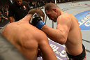 LAS VEGAS, NV - DECEMBER 29:  (R-L) Cain Velasquez punches Junior dos Santos during their heavyweight championship fight at UFC 155 on December 29, 2012 at MGM Grand Garden Arena in Las Vegas, Nevada. (Photo by Donald Miralle/Zuffa LLC/Zuffa LLC via Getty Images) *** Local Caption *** Junior dos Santos; Cain Velasquez