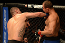 LAS VEGAS, NV - DECEMBER 29:  (L-R) Cain Velasquez punches Junior dos Santos during their heavyweight championship fight at UFC 155 on December 29, 2012 at MGM Grand Garden Arena in Las Vegas, Nevada. (Photo by Donald Miralle/Zuffa LLC/Zuffa LLC via Getty Images) *** Local Caption *** Junior dos Santos; Cain Velasquez