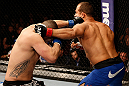 LAS VEGAS, NV - DECEMBER 29:  (L-R) Cain Velasquez punches Junior dos Santos during their heavyweight championship fight at UFC 155 on December 29, 2012 at MGM Grand Garden Arena in Las Vegas, Nevada. (Photo by Josh Hedges/Zuffa LLC/Zuffa LLC via Getty Images) *** Local Caption *** Junior dos Santos; Cain Velasquez