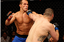 LAS VEGAS, NV - DECEMBER 29:  (R-L) Cain Velasquez punches Junior dos Santos during their heavyweight championship fight at UFC 155 on December 29, 2012 at MGM Grand Garden Arena in Las Vegas, Nevada. (Photo by Josh Hedges/Zuffa LLC/Zuffa LLC via Getty Images) *** Local Caption *** Junior dos Santos; Cain Velasquez