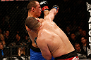 LAS VEGAS, NV - DECEMBER 29:  (R-L) Cain Velasquez punches Junior dos Santos during their heavyweight championship fight at UFC 155 on December 29, 2012 at MGM Grand Garden Arena in Las Vegas, Nevada. (Photo by Josh Hedges/Zuffa LLC/Zuffa LLC via Getty Images) *** Local Caption *** Junior dos Santos; Cain Velasquez