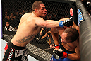 LAS VEGAS, NV - DECEMBER 29:  (L-R) Cain Velasquez punches Junior dos Santos during their heavyweight championship fight at UFC 155 on December 29, 2012 at MGM Grand Garden Arena in Las Vegas, Nevada. (Photo by Josh Hedges/Zuffa LLC/Zuffa LLC via Getty Images) *** Local Caption *** Junior dos Santos; Cain Velasquez