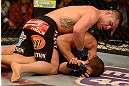 LAS VEGAS, NV - DECEMBER 29:  Cain Velasquez (top) punches Junior dos Santos during their heavyweight championship fight at UFC 155 on December 29, 2012 at MGM Grand Garden Arena in Las Vegas, Nevada. (Photo by Donald Miralle/Zuffa LLC/Zuffa LLC via Getty Images) *** Local Caption *** Junior dos Santos; Cain Velasquez