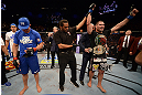 LAS VEGAS, NV - DECEMBER 29:  Cain Velasquez (right) is named the winner over Junior dos Santos (left) after their heavyweight championship fight at UFC 155 on December 29, 2012 at MGM Grand Garden Arena in Las Vegas, Nevada. (Photo by Donald Miralle/Zuffa LLC/Zuffa LLC via Getty Images) *** Local Caption *** Junior dos Santos; Cain Velasquez