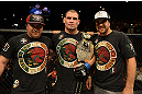 LAS VEGAS, NV - DECEMBER 29:  Cain Velasquez poses with his teammates after his heavyweight championship fight against Junior dos Santos at UFC 155 on December 29, 2012 at MGM Grand Garden Arena in Las Vegas, Nevada. (Photo by Donald Miralle/Zuffa LLC/Zuffa LLC via Getty Images) *** Local Caption *** Junior dos Santos; Cain Velasquez