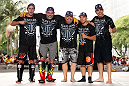 SAO PAULO, BRAZIL - JANUARY 16:  Gabriel Gonzaga (second from left) poses for photos with his team after an open workout session for media and fans on January 16, 2013 at Parque Anhangaba&Atilde;&ordm; in Sao Paulo, Brazil. (Photo by Josh Hedges/Zuffa LLC/Zuffa LLC via Getty Images)