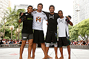 SAO PAULO, BRAZIL - JANUARY 16:  Milton Vieira (second from right) poses for photos with his team after an open workout session for media and fans on January 16, 2013 at Parque Anhangabau in Sao Paulo, Brazil. (Photo by Josh Hedges/Zuffa LLC/Zuffa LLC via Getty Images)