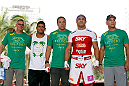 SAO PAULO, BRAZIL - JANUARY 16:  Vitor Belfort (second from right) poses for photos with his team after an open workout session for media and fans on January 16, 2013 at Parque Anhangabau in Sao Paulo, Brazil. (Photo by Josh Hedges/Zuffa LLC/Zuffa LLC via Getty Images)